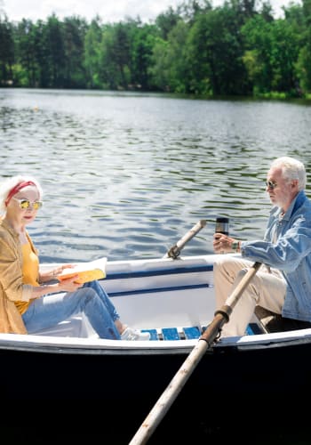 Seniors enjoying time in a canoe near The Iris Senior Living in Great Falls, Montana