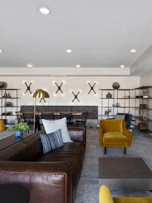 Clubhouse with seating area at Axle Apartments in Fridley, Minnesota