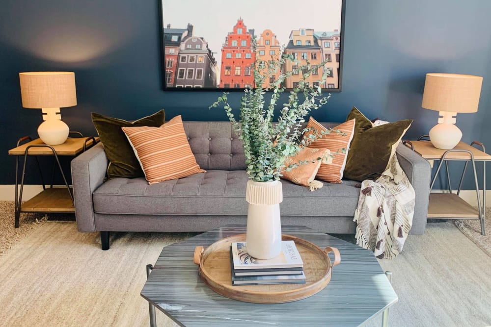 Sofa and coffee table in the living room of a model home at 927 West Morgan in Raleigh, North Carolina