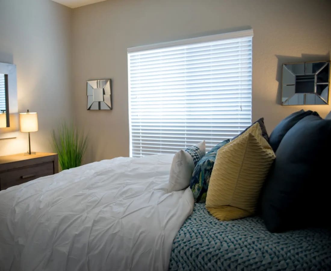 Furnished model bedroom at Waterford Place in Folsom, California