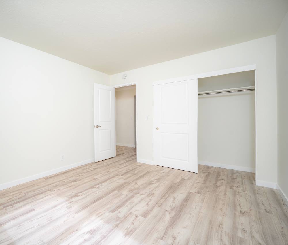 Unfurnished bedroom with closets at The Chateau Apartments in Mountain View, California