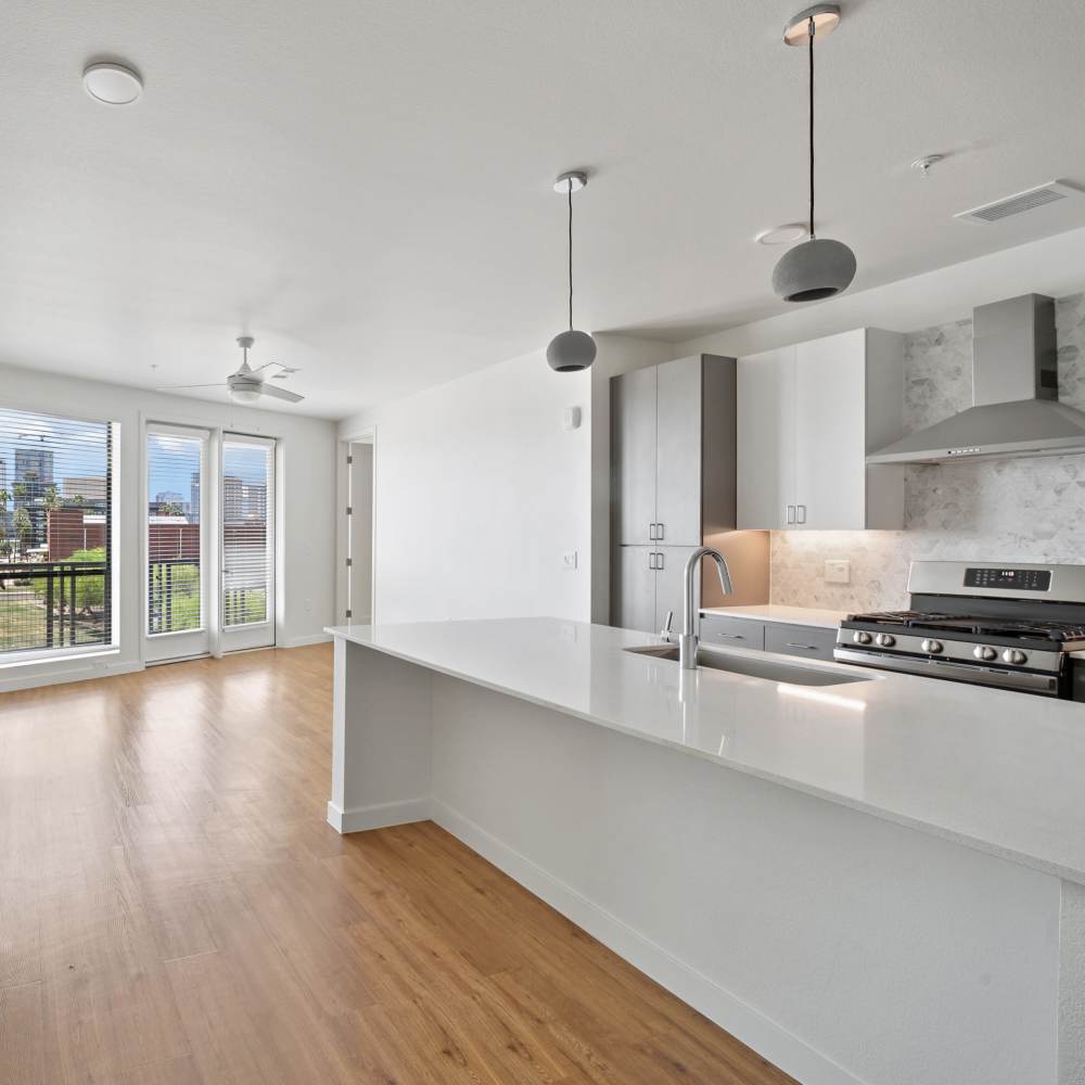 Spacious kitchen with a granite countertop at Lydian in Phoenix,Arizona