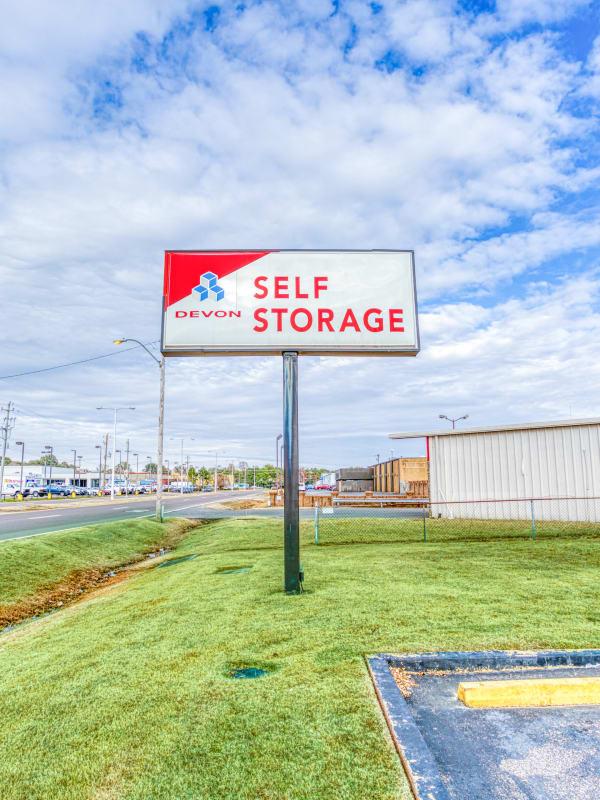 Sign in front of entry into Devon Self Storage in Memphis, Tennessee