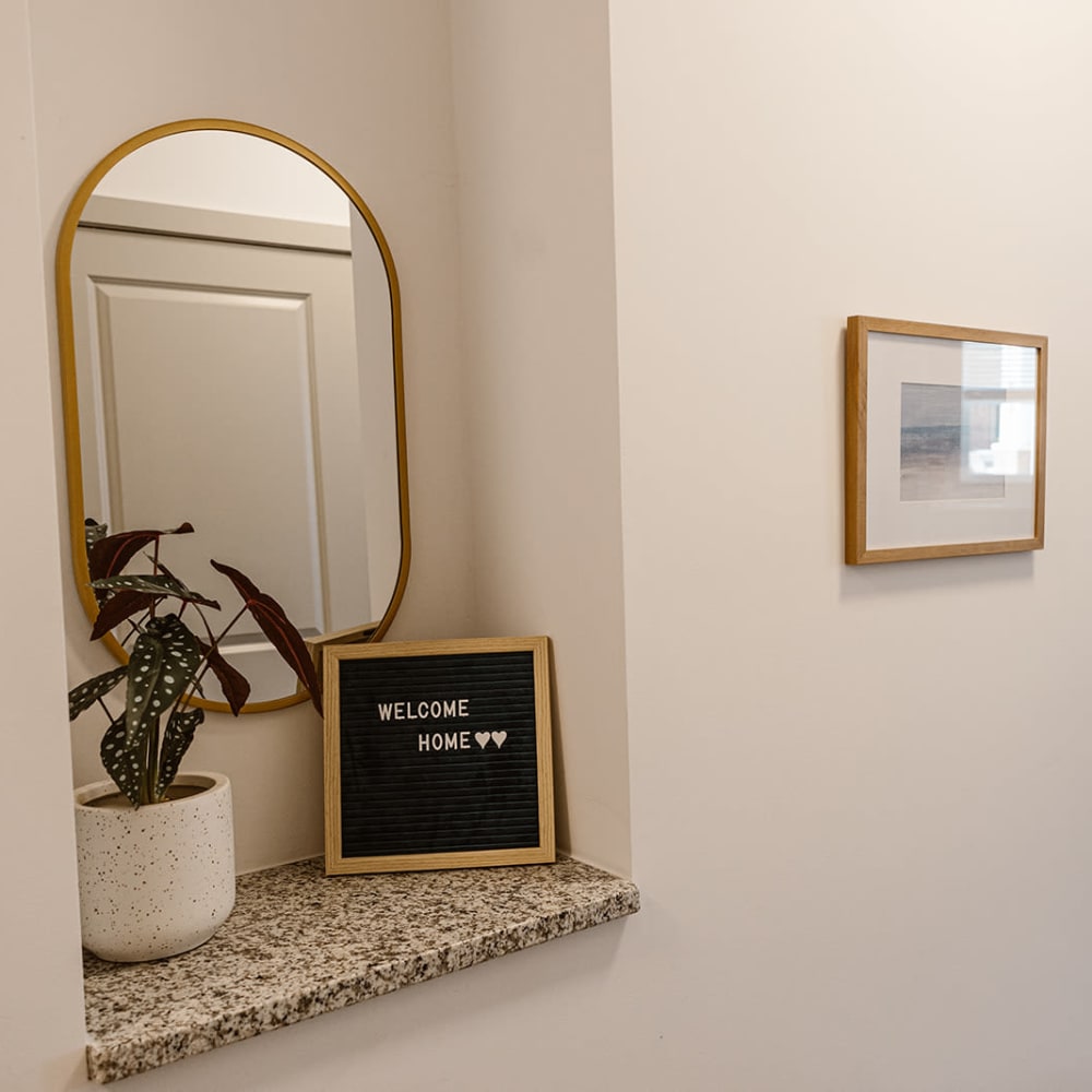 Inspirational board and clean mirror at Center West Apartments in Midlothian, Virginia