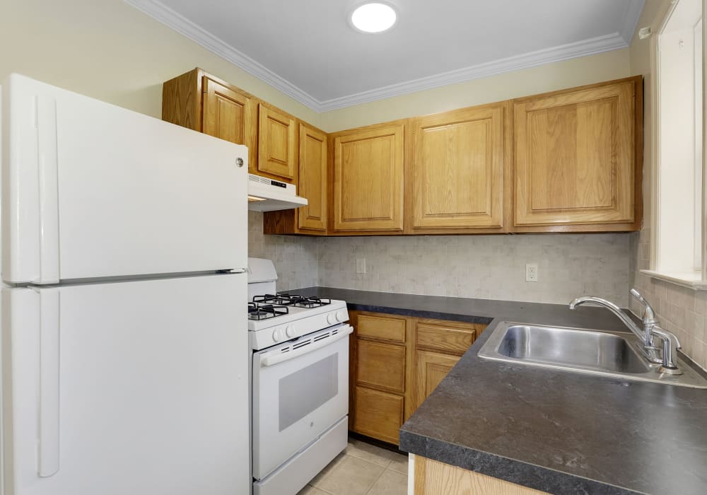 Fully-equipped kitchen at Mayflower Apartments in Ridgewood, New Jersey