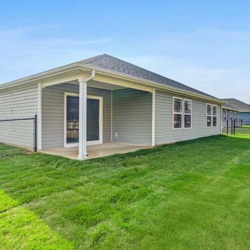 Home with a fenced backyard at Lakes at Heather Ridge in Fort Wayne, Indiana