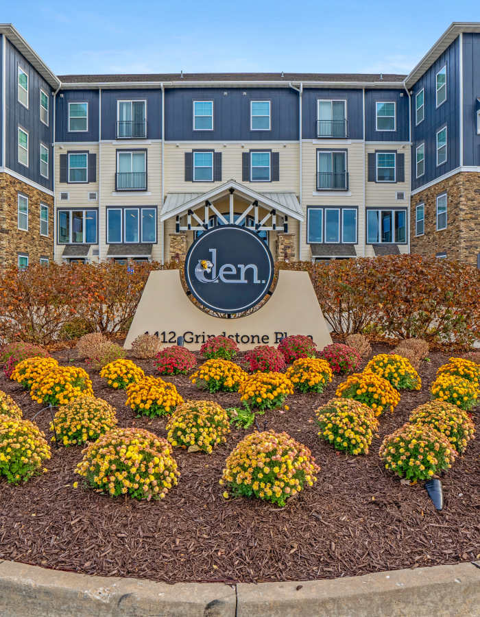 Property signage at The Den in Columbia, Missouri