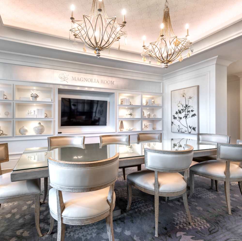 Elegant dining area with glass table at Novel Turtle Creek in Dallas, Texas