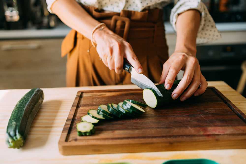Women cutting a cucumber at Stonehurst Manor and Harrison Court in Upper Darby Township, Pennsylvania