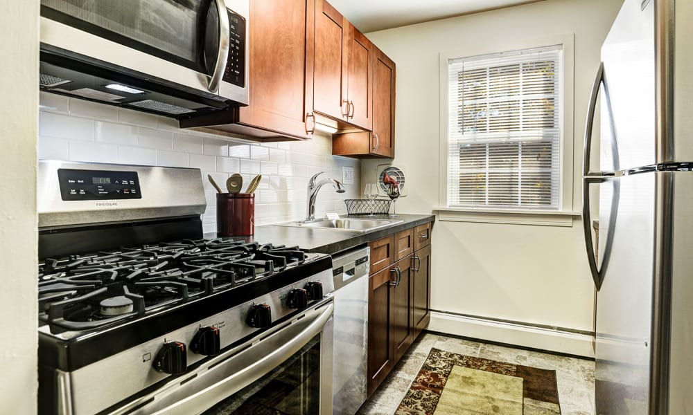 Sleek, modern kitchen at Lehigh Plaza Apartments in Bethlehem, Pennsylvania