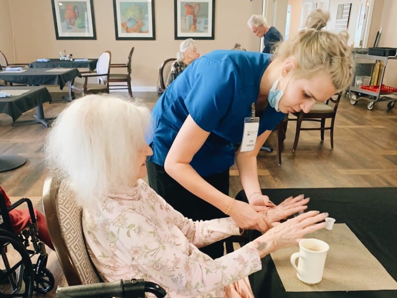 A resident getting her nails done at English Meadows Blacksburg Campus in Blacksburg, Virginia