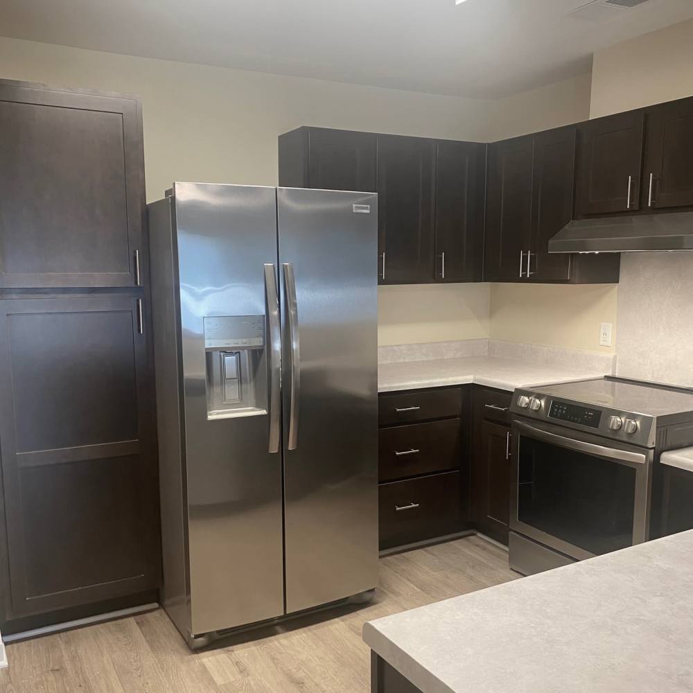 Stainless-steel appliances in a kitchen at Saratoga Place Apartments in Suffolk, Virginia
