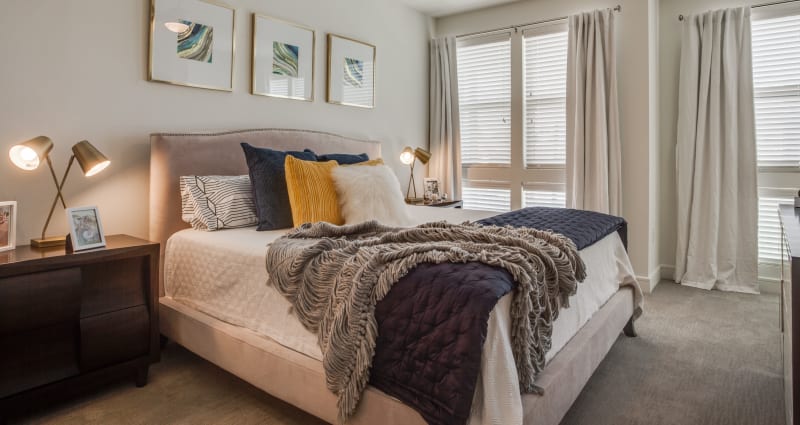 Well decorated bedroom at Atwood at Ellison in Dallas, Texas