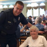 Happy senior woman at Eastern Star Masonic Retirement Campus in Denver, CO
