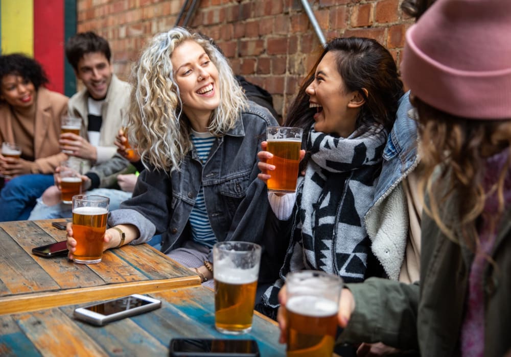 Residents enjoying drinks near Division Terrace in Portland, Oregon