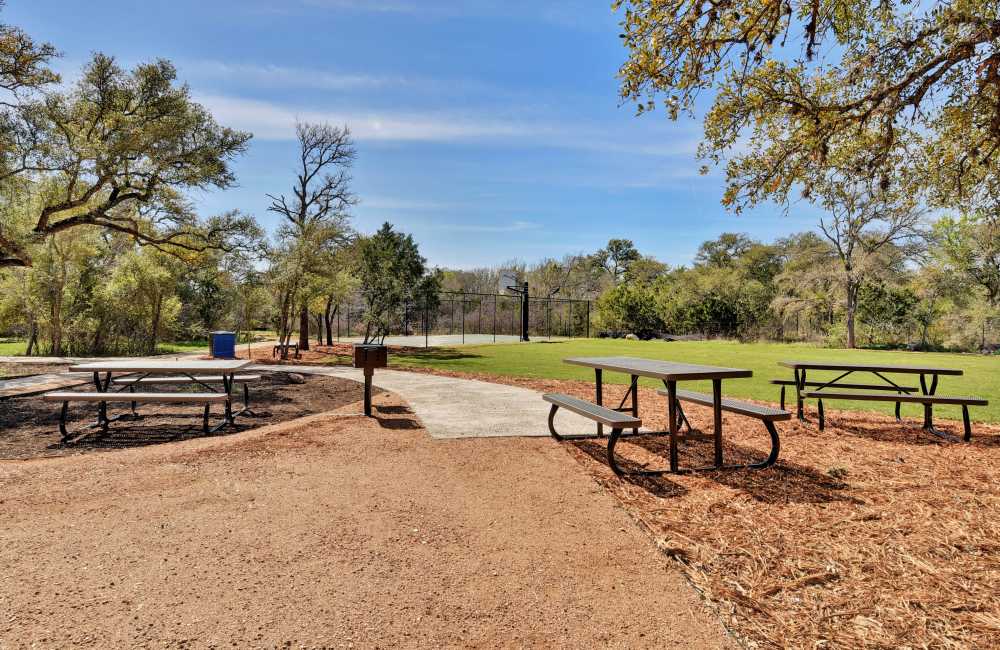 Outdoor seating area at Homestead Oaks Apartments in Austin,Texas