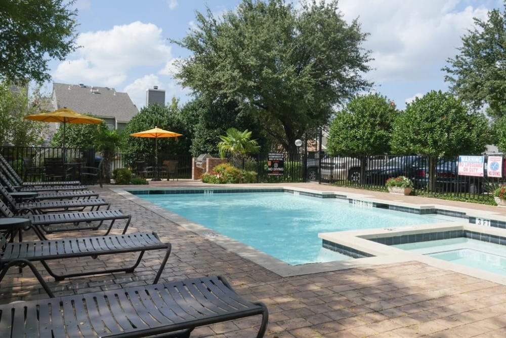 Shimmering pool and sundeck at The Park at Ashford in Arlington, Texas