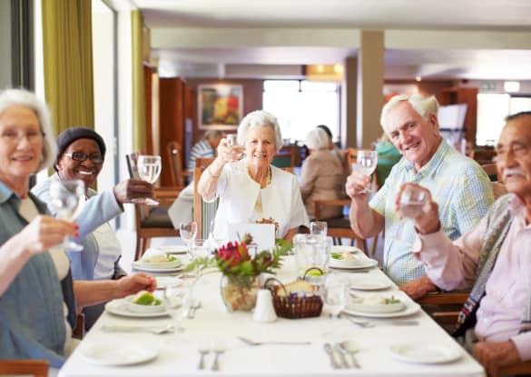 Friends eating together at West Chester Assisted Living and Memory Care in West Chester, Ohio