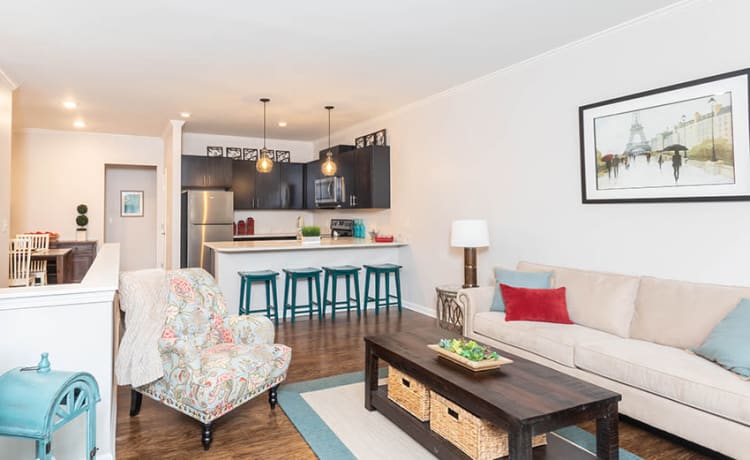 Spacious living room at North Ponds Apartments home