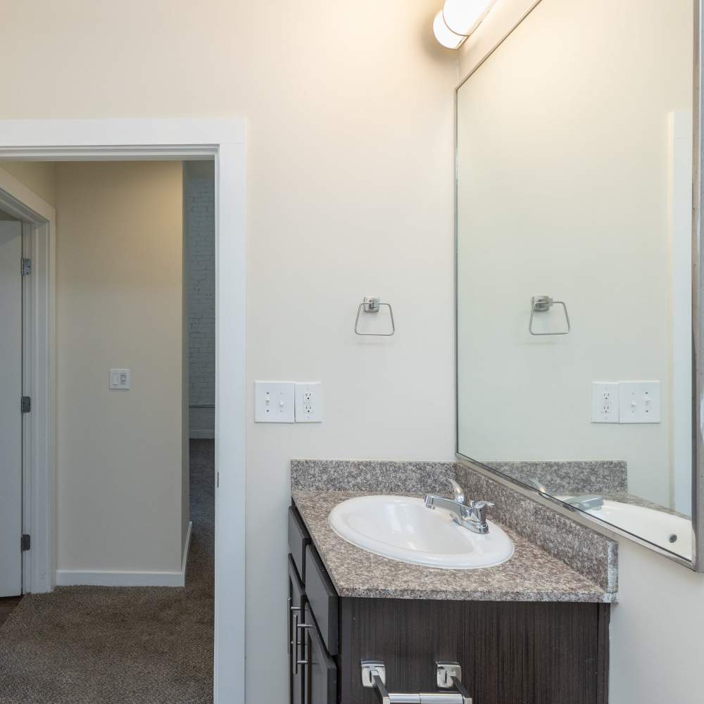 Vanity sink of bathroom at Lofts at Inman Mills in Inman, South Carolina