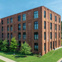 Exterior shot of the building at Lofts at Inman Mills in Inman, South Carolina