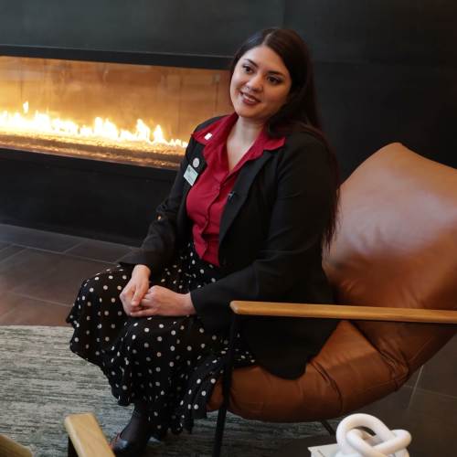 Team members collaborating during a community meeting at Pillar Properties in Seattle, Washington