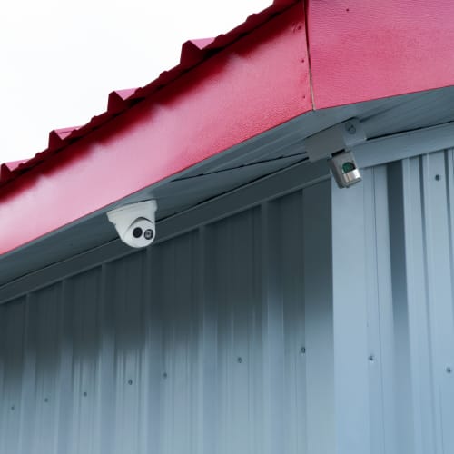 Security cameras mounted on a roof at Red Dot Storage in Denham Springs, Louisiana