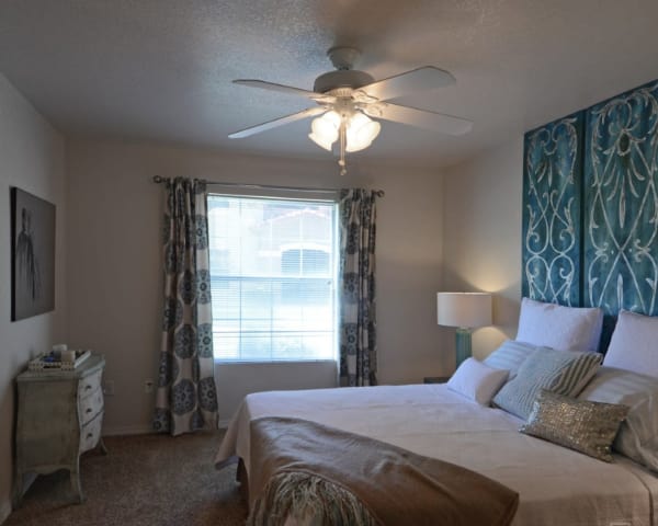 Cozy bedroom at La Ventana Apartment Homes