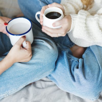 Residents holding their coffee mugs at Skyline Redmond in Redmond, Washington