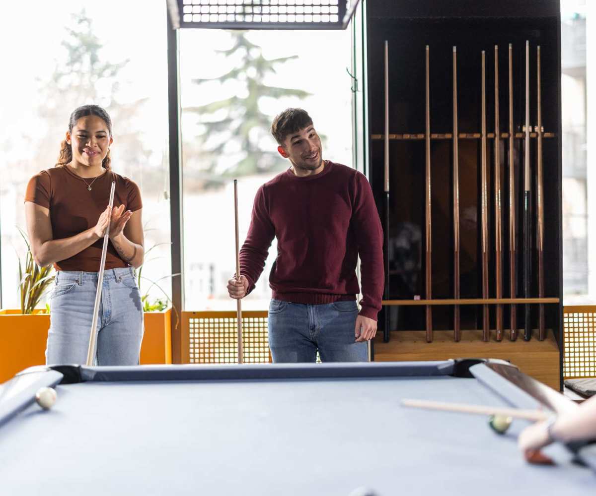 Resident friends playing in clubhouse at Emerald Place in Lancaster, Ohio