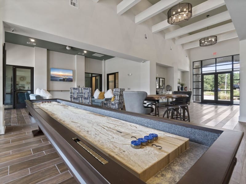 Clubhouse shuffleboard table at Auberge of Tyler in Tyler, Texas