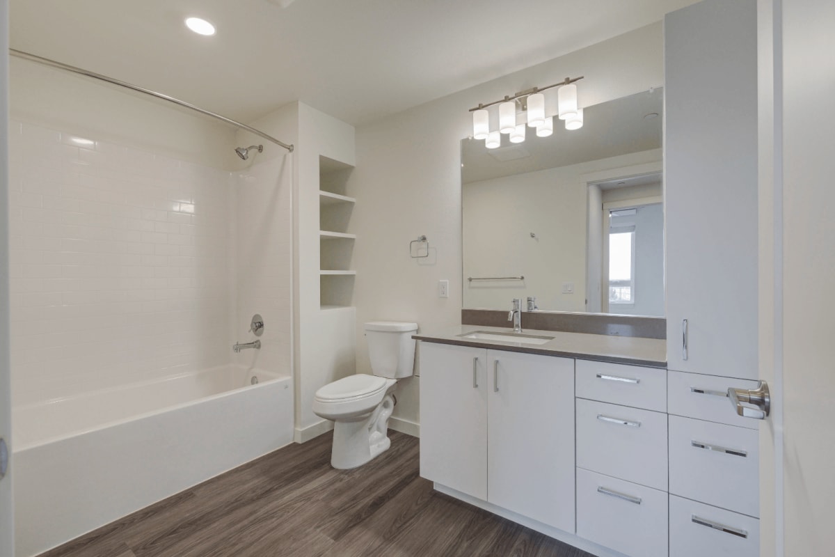 Bathroom with hardwood flooring at The Quarry in Hillsboro, Oregon