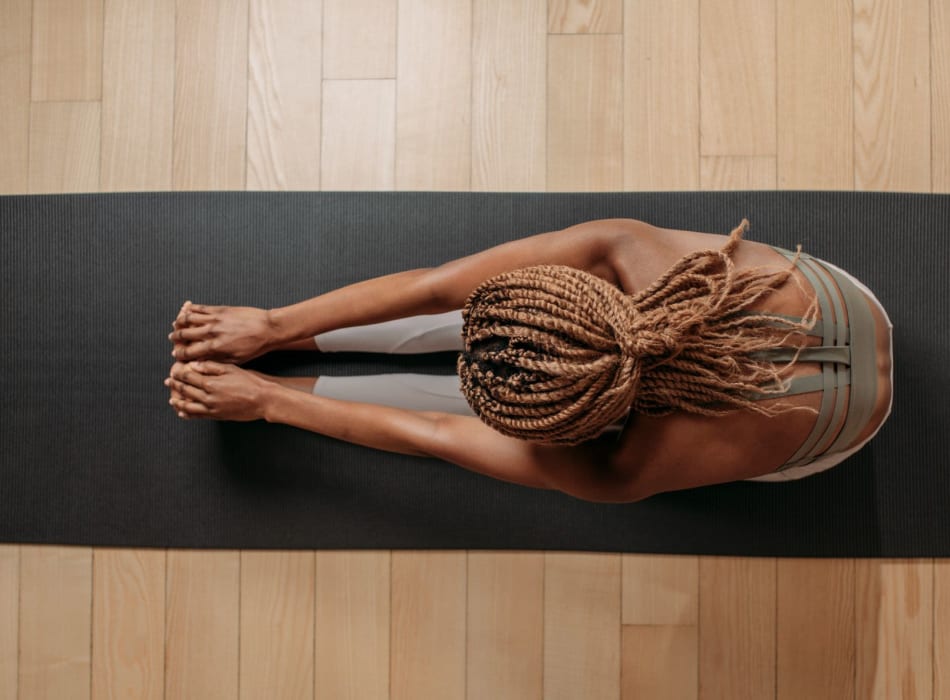 Resident stretching in her new gym at Nine 88 in South San Francisco, California