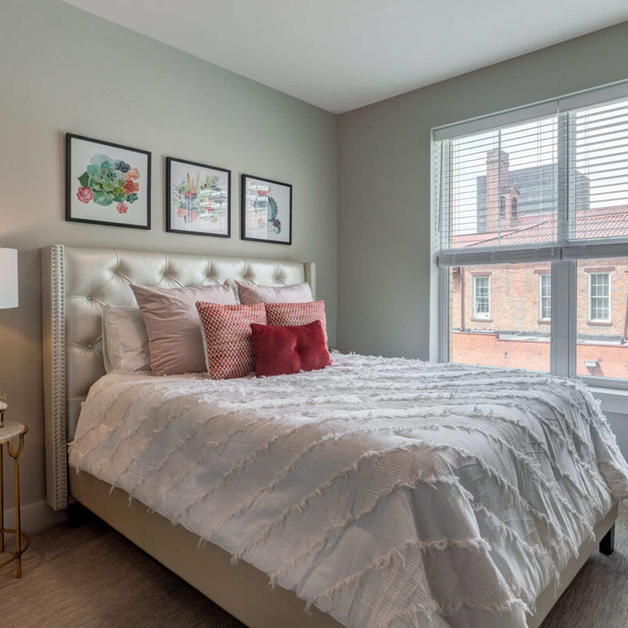 Bright bedroom with window at Xander on State in , Ohio