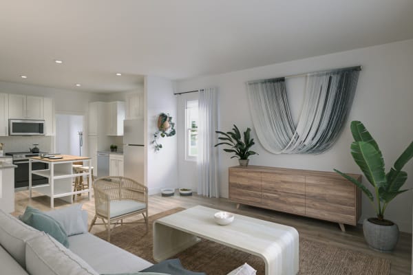 Furnished living room with wood-style flooring at Hamlet at MidCity in Huntsville, Alabama