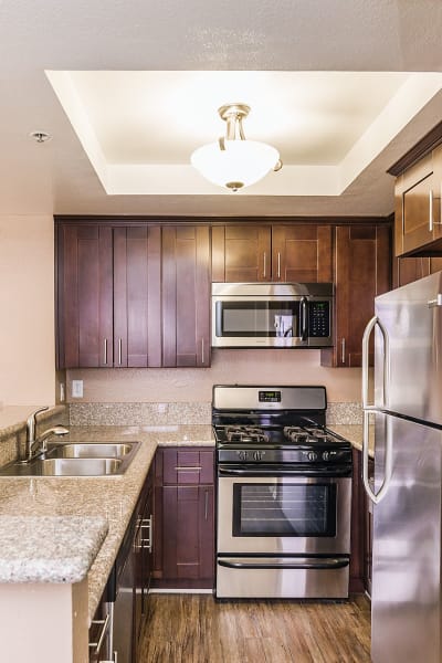 Well equipped kitchen with stainless-steel appliances at Marlon Manor Apartments, Los Angeles, California