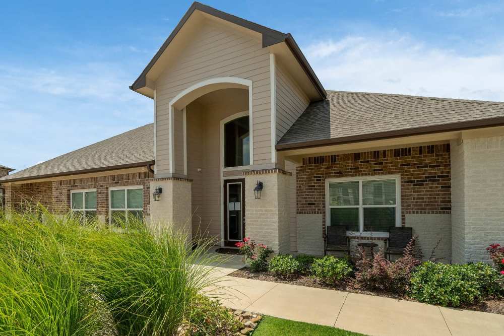 Community room exterior view at Pine Creek in Paris, Texas