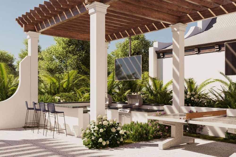 Outdoor grill area with pergola and seating at Brisa at St. Augustine in St. Augustine, Florida