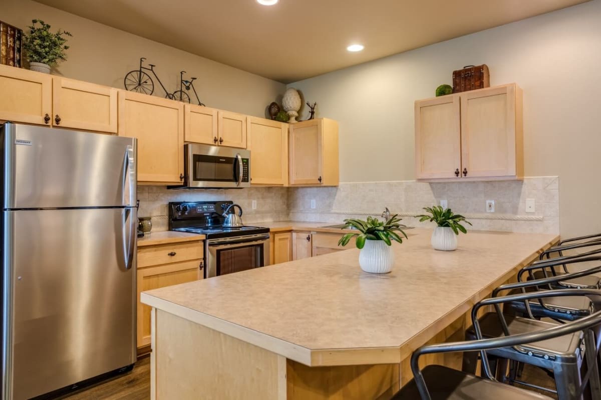 Kitchen with stainless-steel appliances at Rockwood Lodge in Coeur D Alene, Idaho