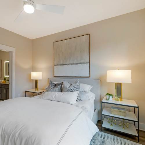 Bedroom with large comfortable bed at The Calvert in Charlotte, North Carolina