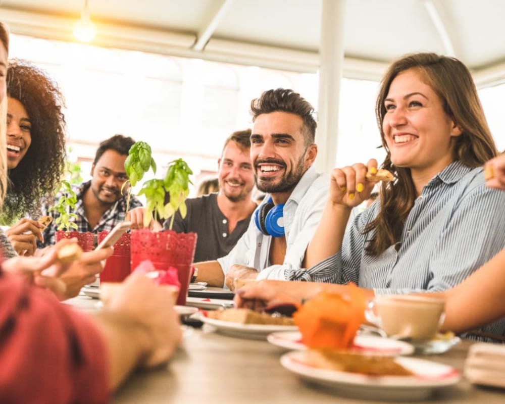 Residents enjoying a meal near The Emery at Terra Nova in Chula Vista, California