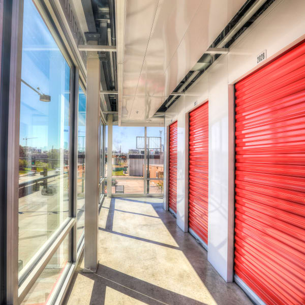 Interior units with bright doors at StorQuest Self Storage in Denver, Colorado