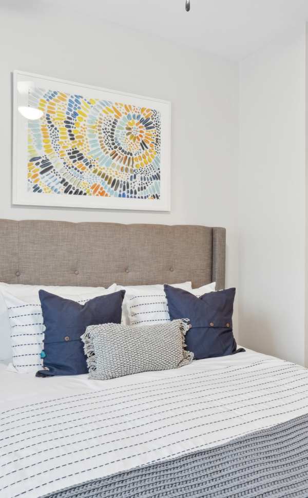 Bedroom with a walk-in closet at Walnut Lake in Urbandale, Iowa