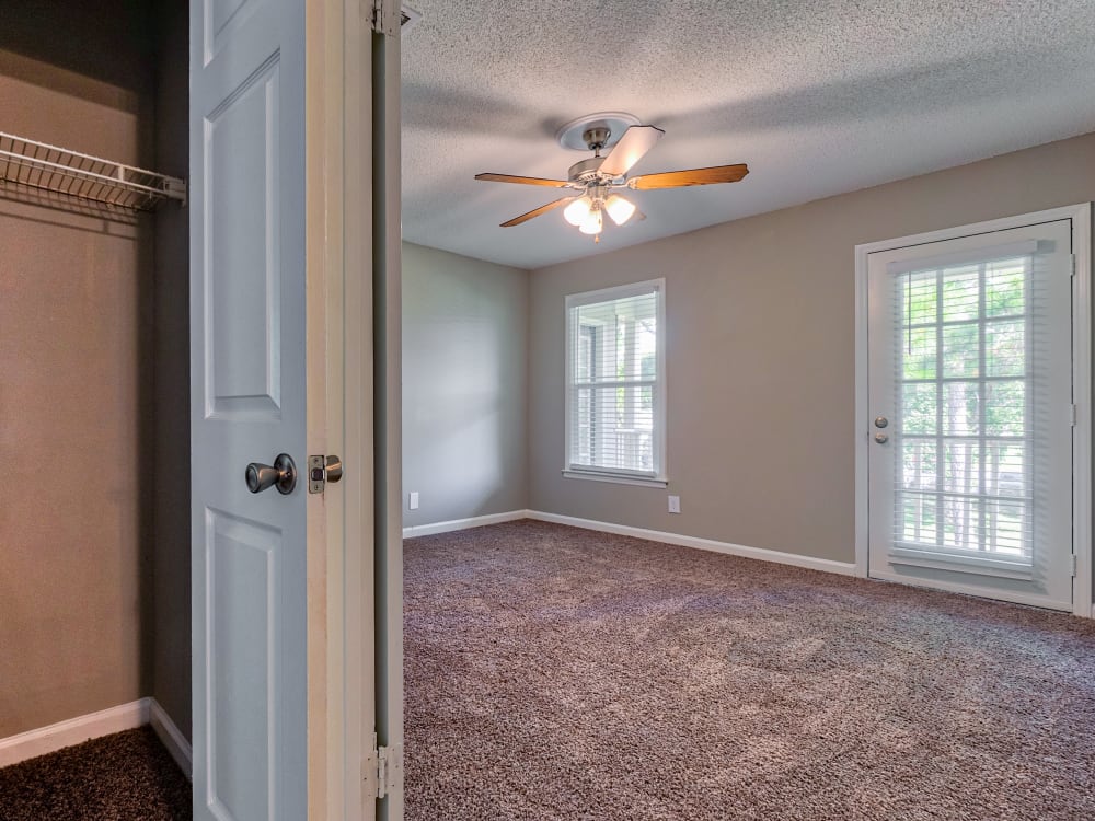 closet and bedroom at The Gatsby at Midtown Apartment Living in Montgomery, AL