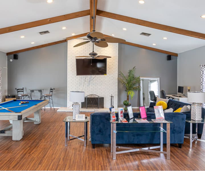 Clubhouse with wooden flooring at Stonebridge Manor Apartments in Gretna, Louisiana