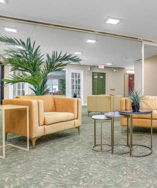 Sitting area in the clubhouse at Farmington Oaks Apartments in Farmington, Michigan