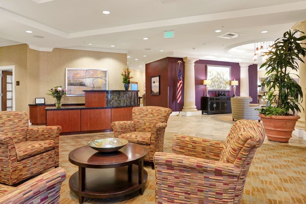 Warm and inviting lobby with seating at The Bellettini in Bellevue, Washington