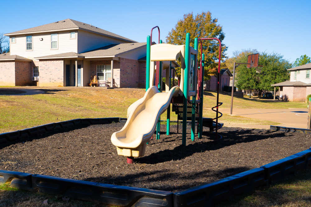 Playground at Millpoint Townhomes in Henderson, Texas
