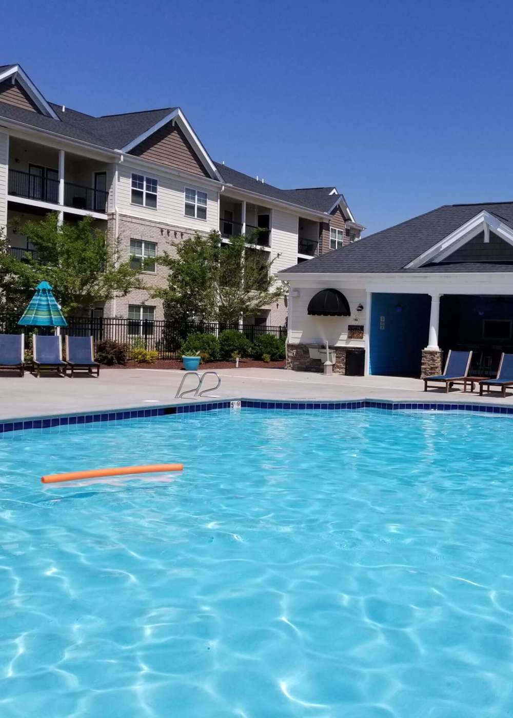 Resort-style swimming pool at Palisades of Jacksonville in Jacksonville, North Carolina