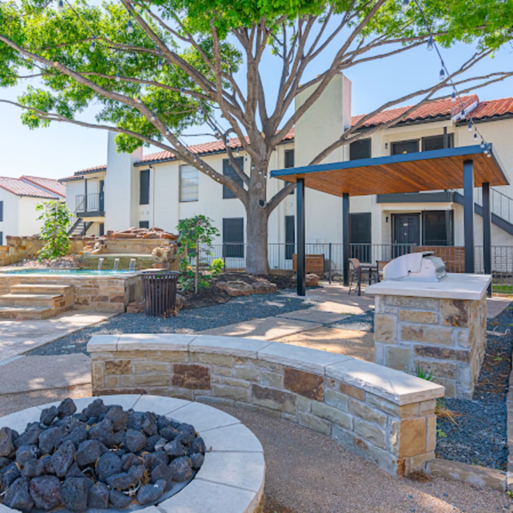 Resident area with firepit at Athena Apartments in Benbrook, Texas